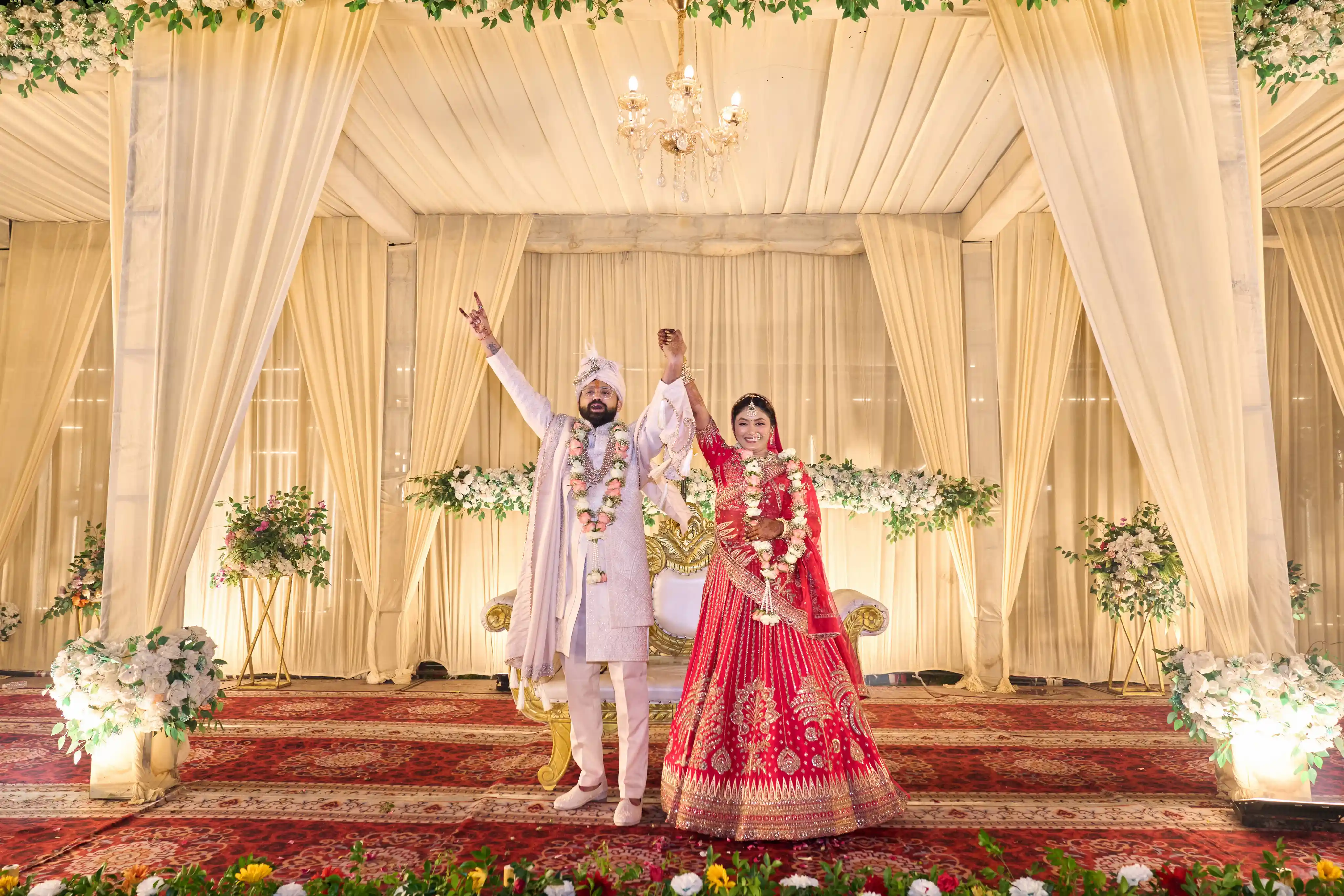 Wedding photography at Hotel Divine Banaras Varanasi - jaimala celebration stage by The WeddingShoot